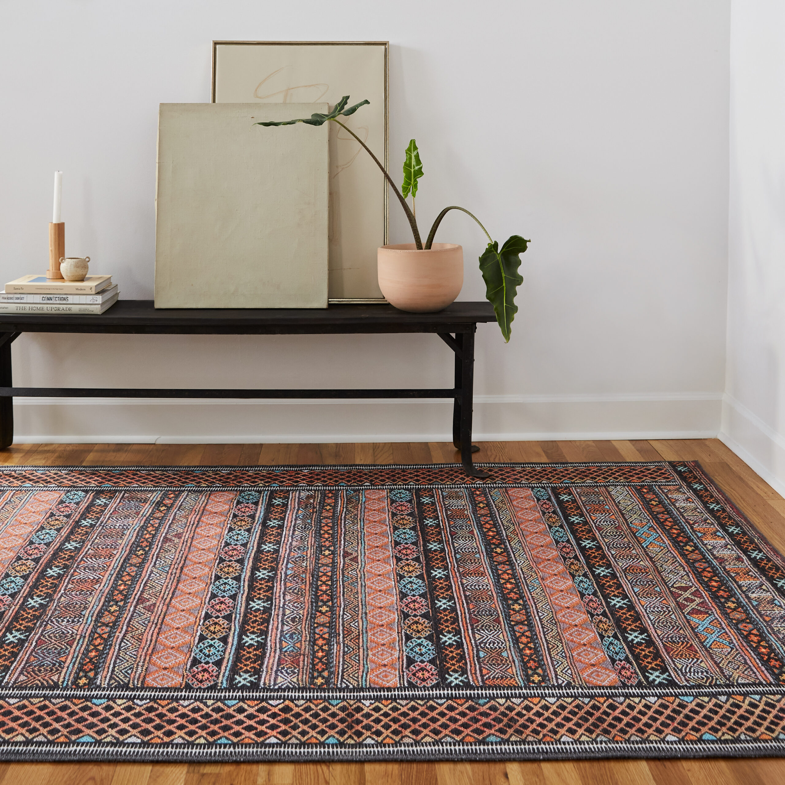 A patterned vintage-inspired rug in an entryway